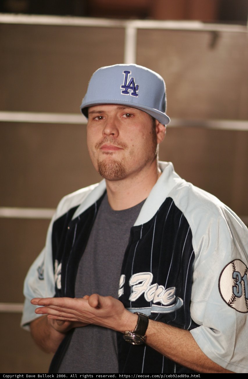 Man in Blue and White Baseball Jersey
