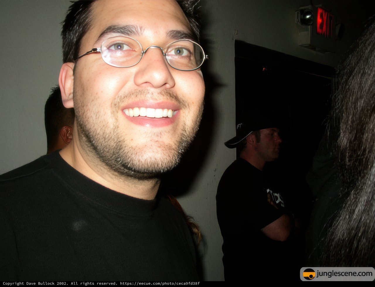 Smiling man with glasses