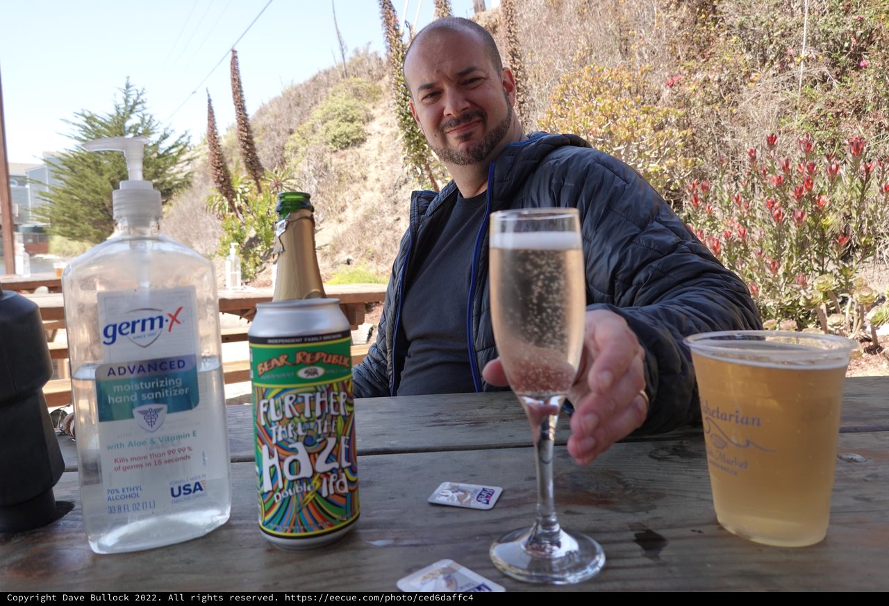 Outdoor Toast with Champagne and Hand Sanitizer