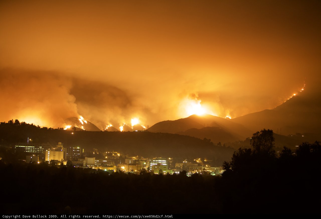 Inferno Engulfs the City and Mountains