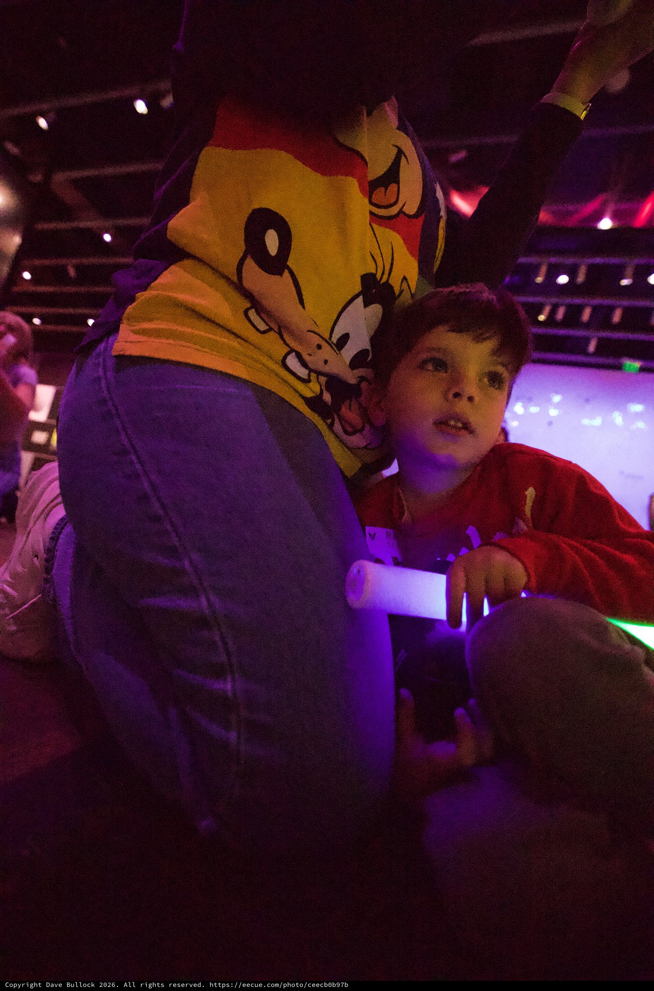 Child and Mascot at Baby Rave Event