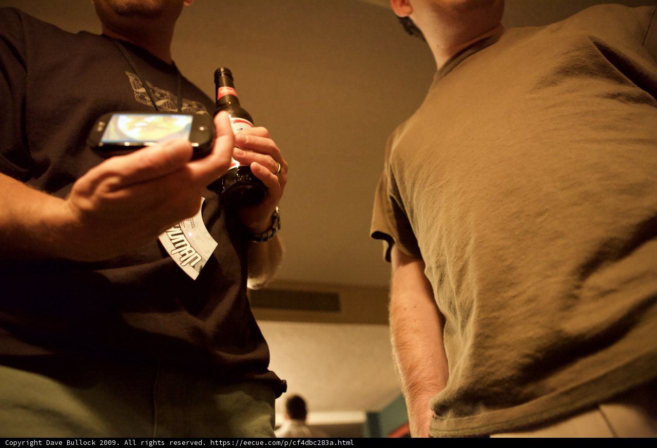 Two Men Chatting and Texting