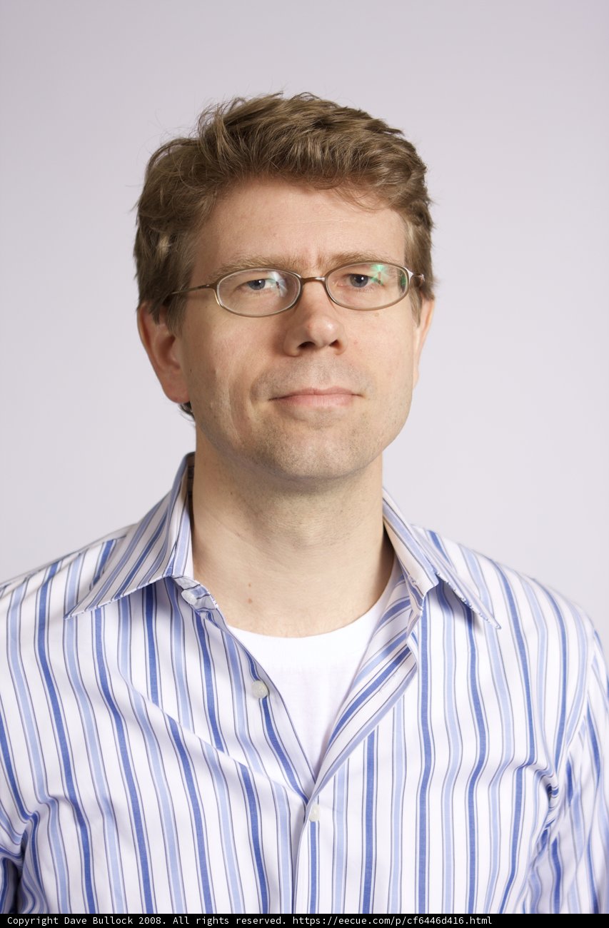 Happy Man in Striped Dress Shirt