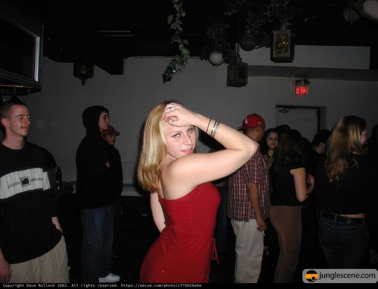 Lady in Red: Standing Out in a Crowded Night Club