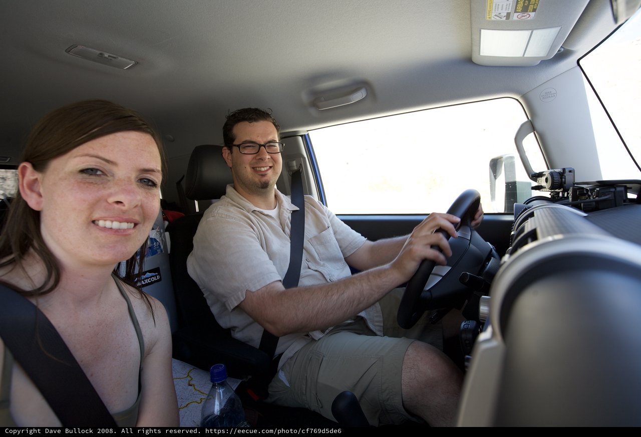 Road Trip Couple Smiling During Desert Drive