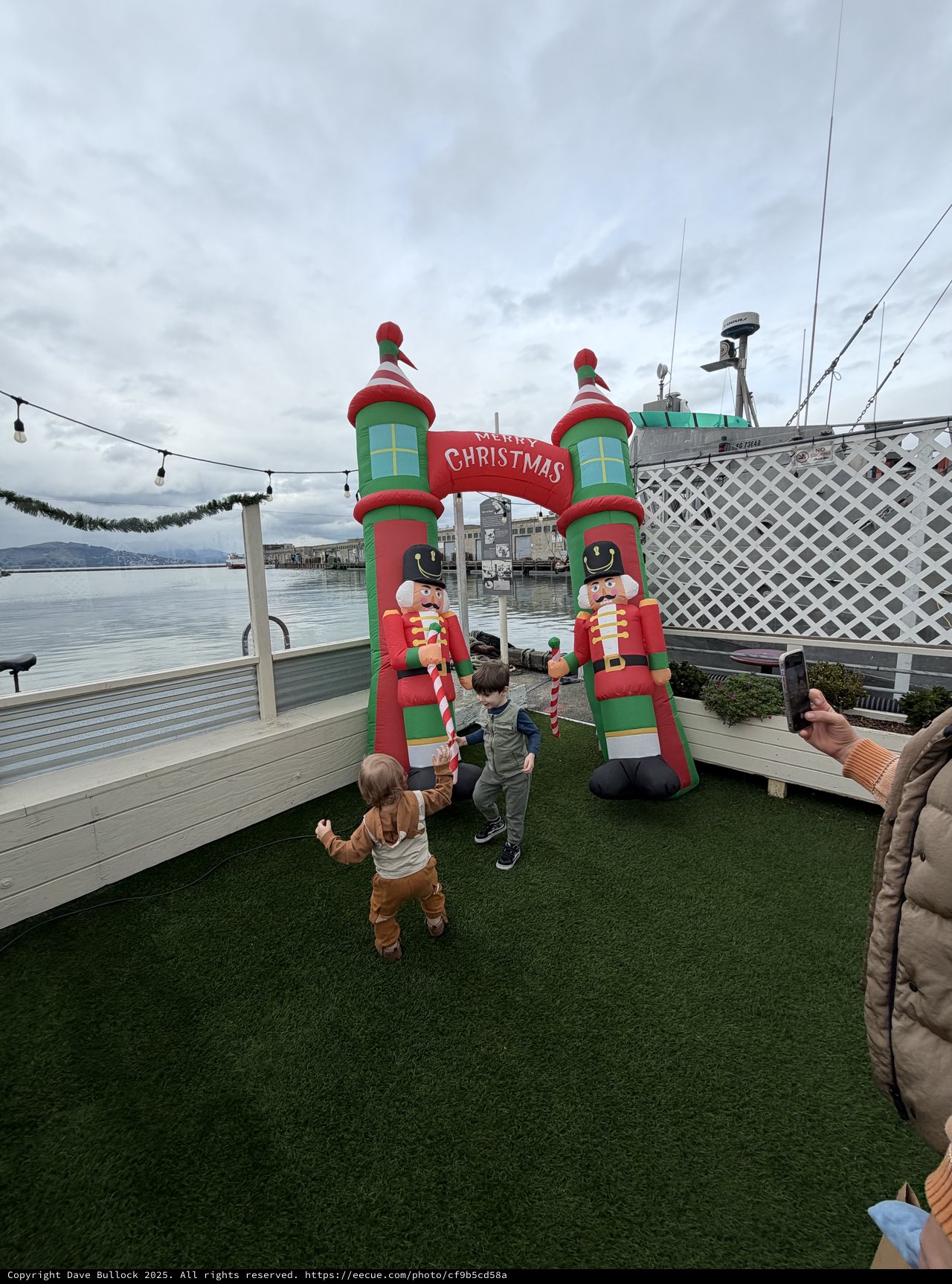 Children Playing at Waterfront Christmas Display
