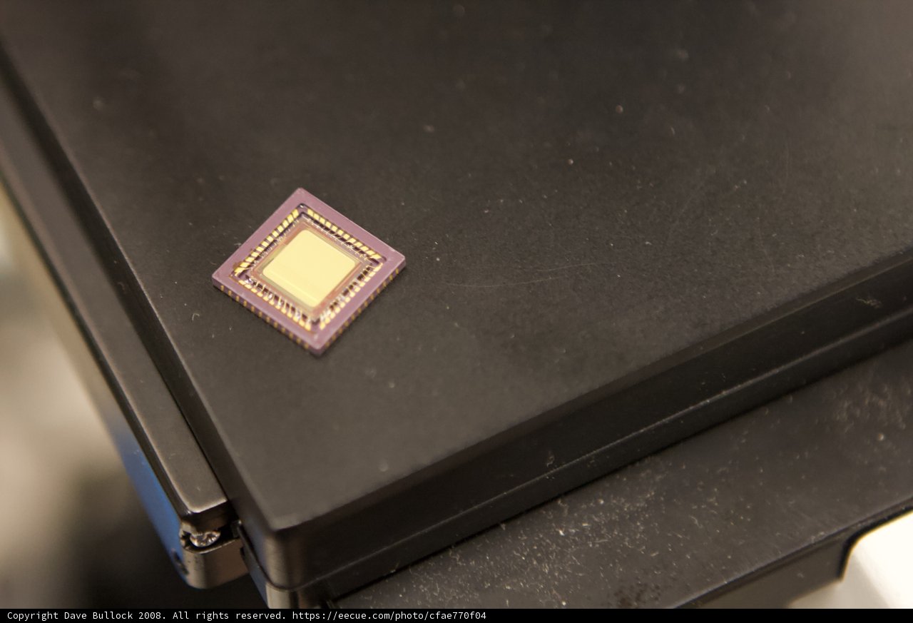 Tiny Square on Black Laptop