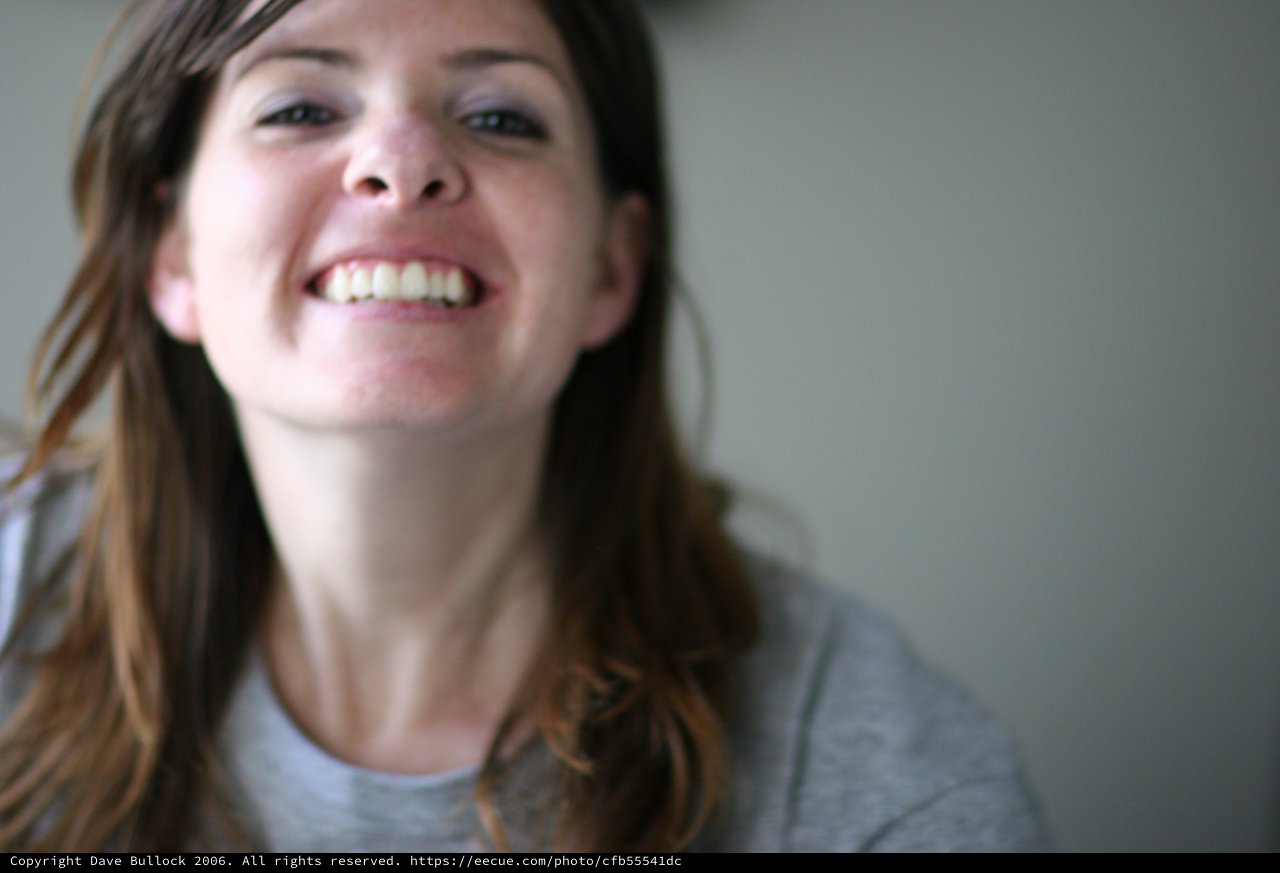 Laughing Woman with Long Brown Hair Portrait