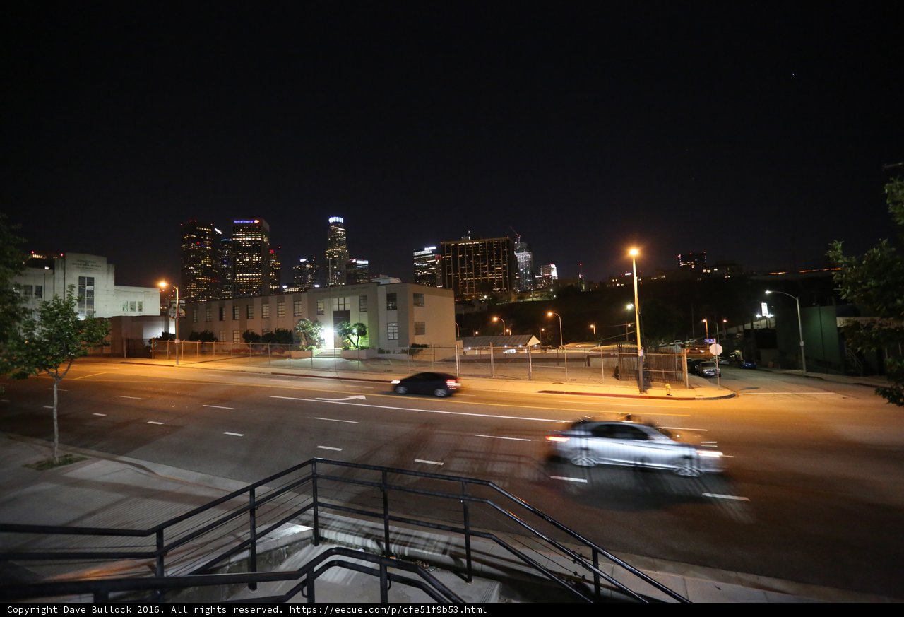 Nighttime View of Busy City Intersection