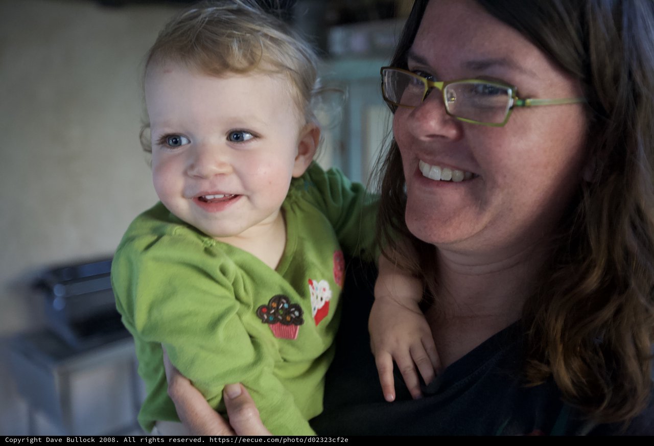 Joyful Toddler and Mother Share a Warm Moment