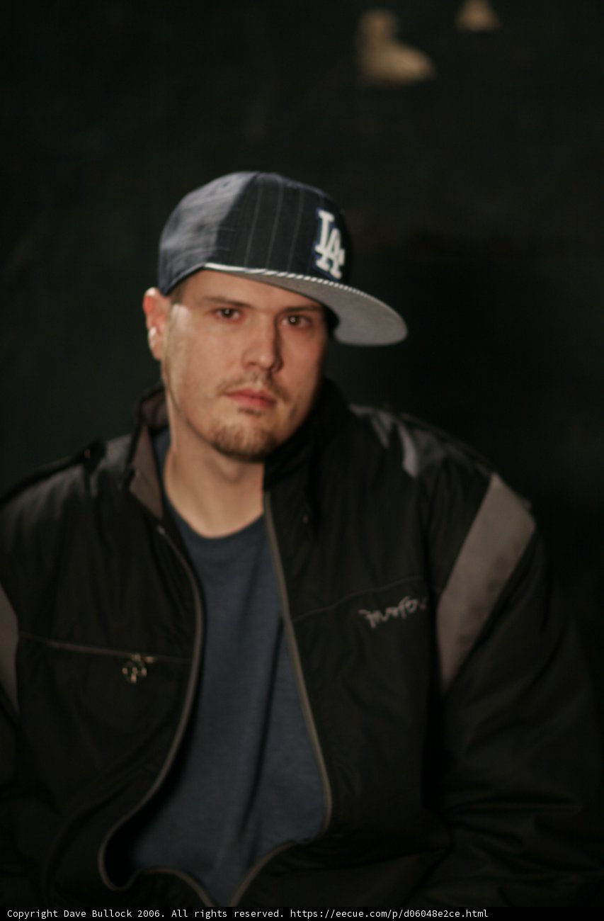 Stylish Man in a Jacket and Cap