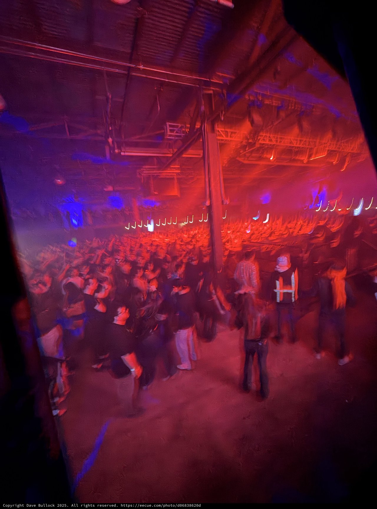 Red and Blue Lit Concert Crowd from Above