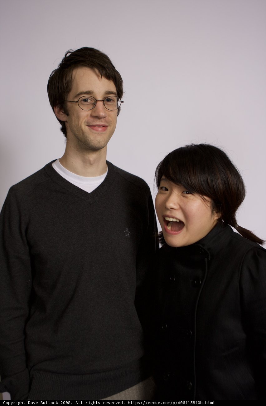 Smiling Couple in Cozy Sweaters