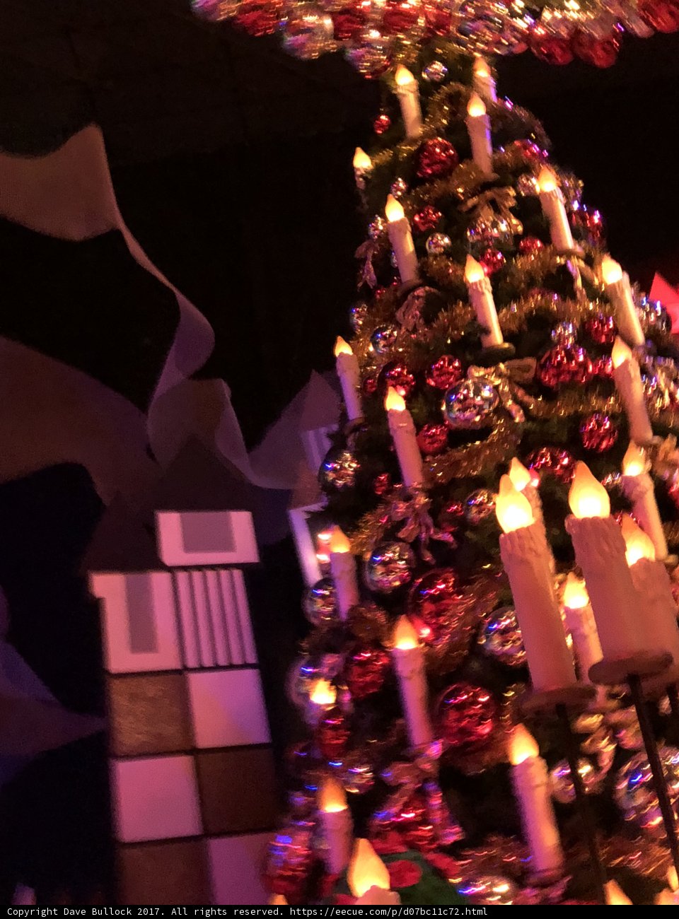Festive Christmas Tree with Eight Lit Candles