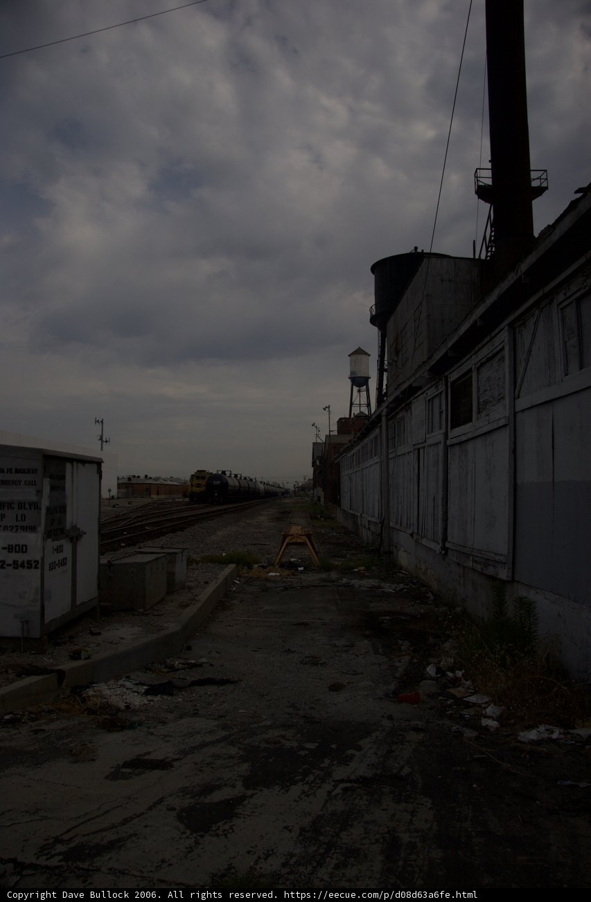 Train passing by urban factory
