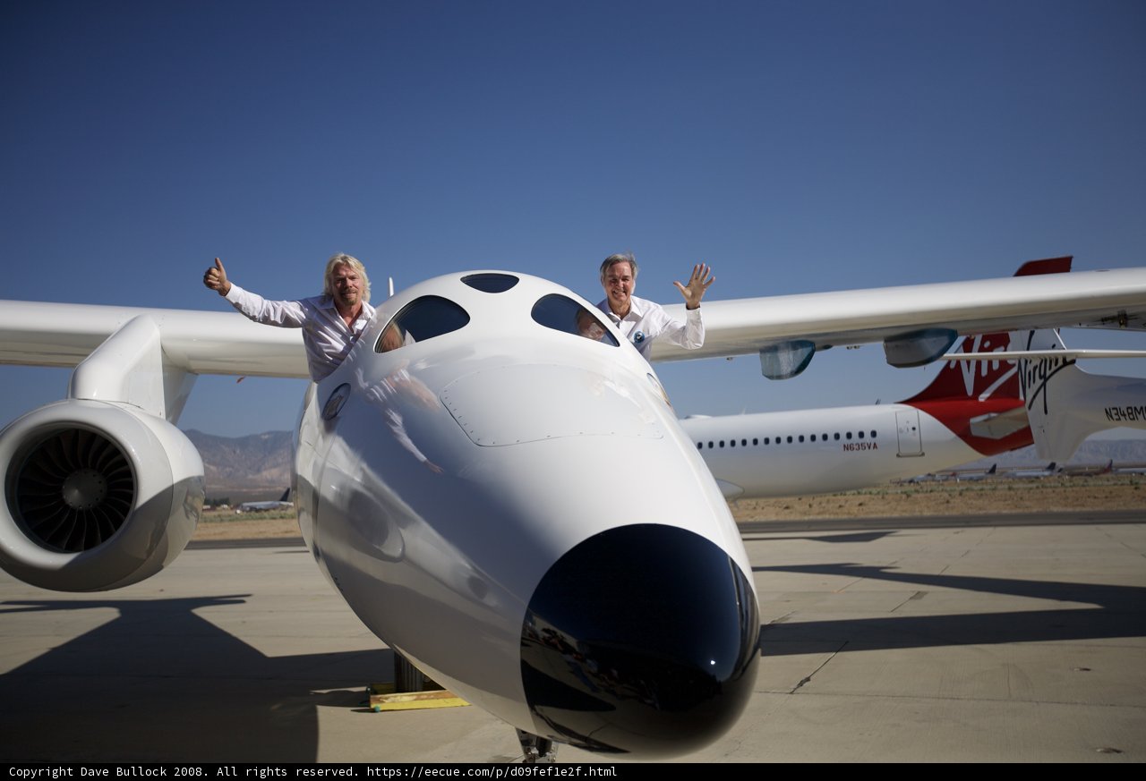 Famous Aviation Innovators Stand Proudly on Nose of White Knight Two