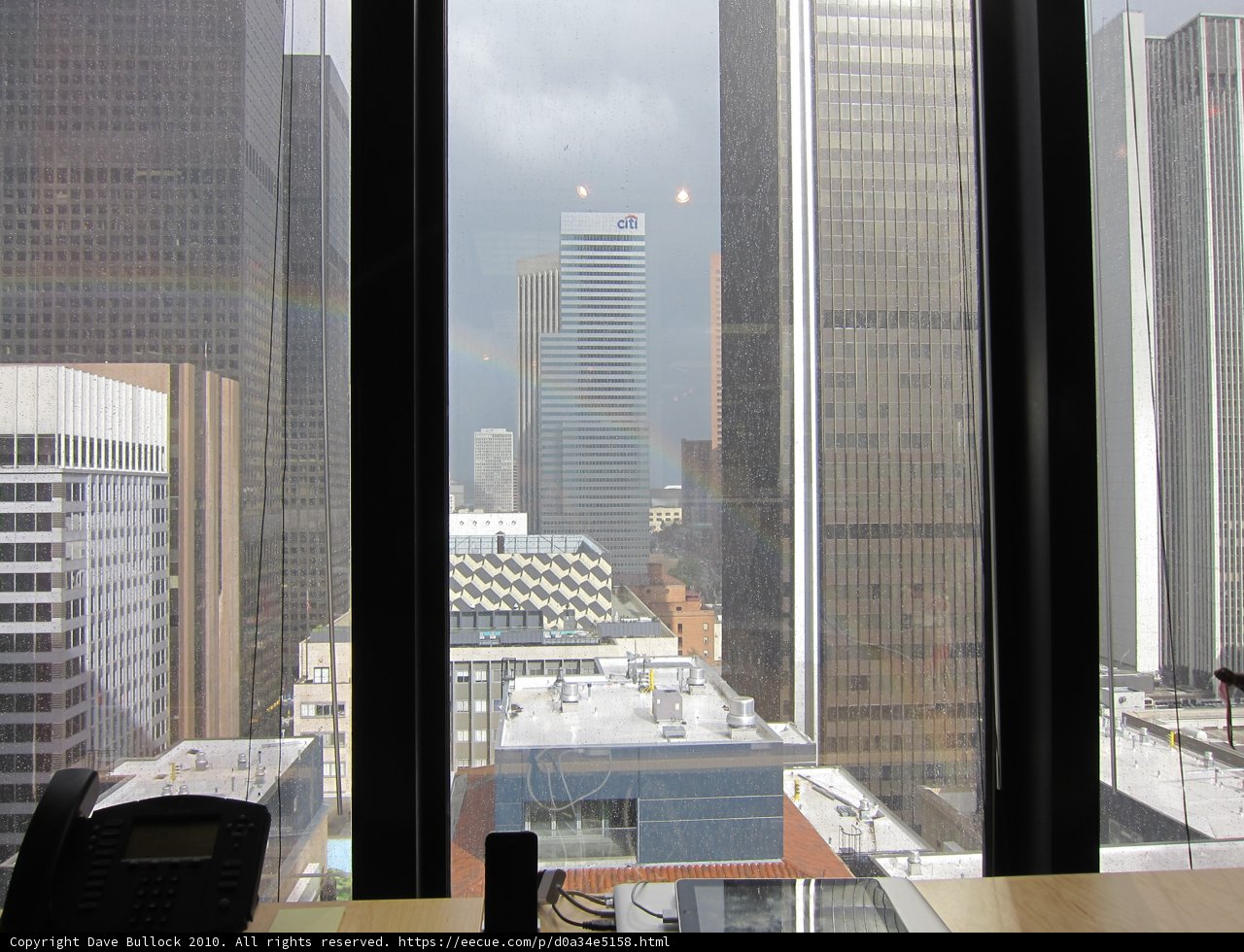 Cityscape view from a high-rise apartment window