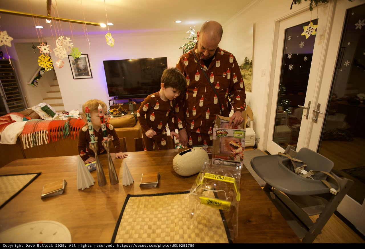 Father and Son Building Together on Christmas Morning
