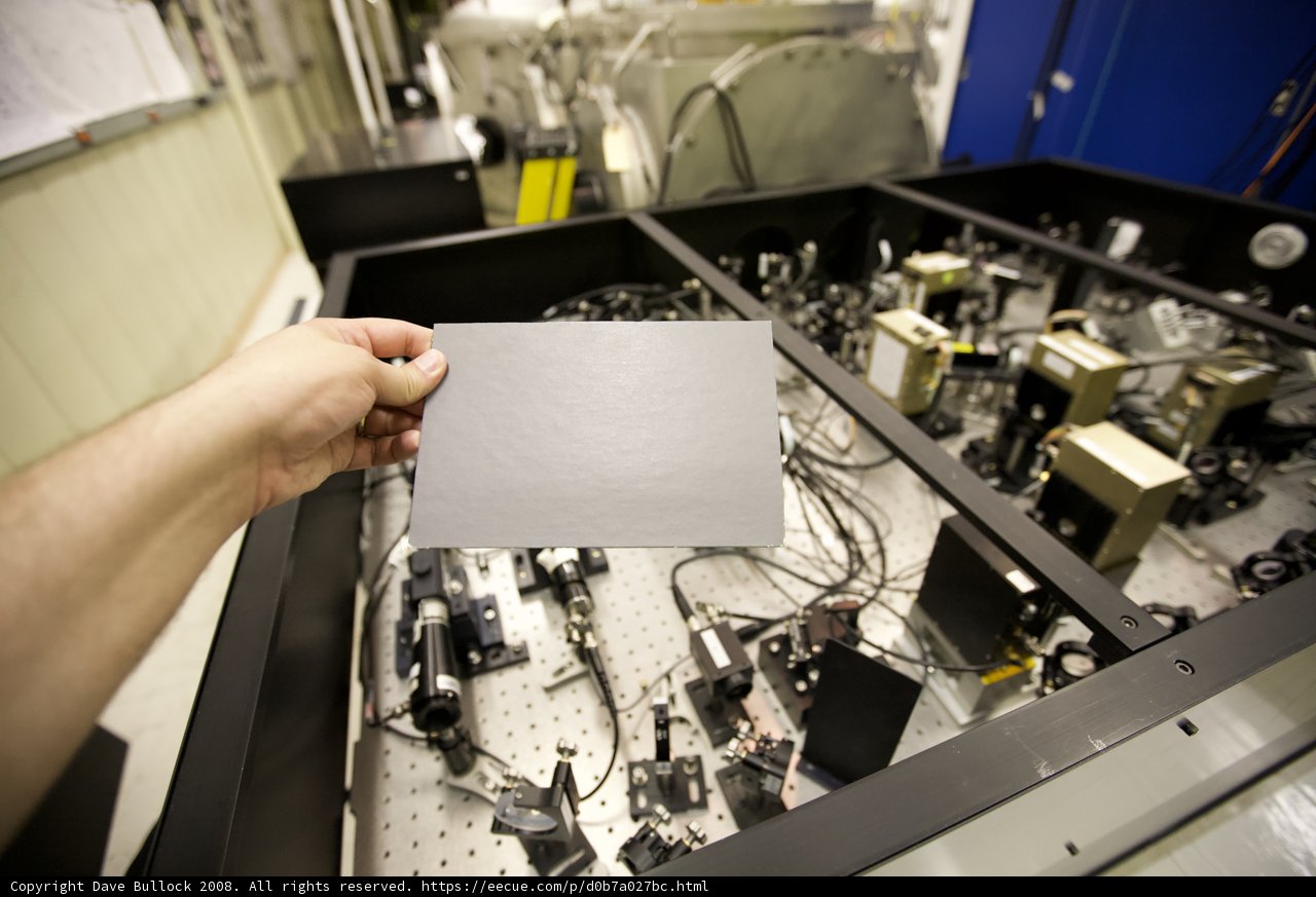 Man operating electronics manufacturing machine
