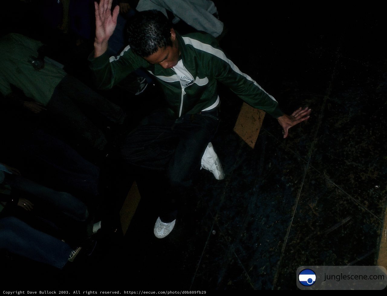 The Dancing Man in the Green Jacket
