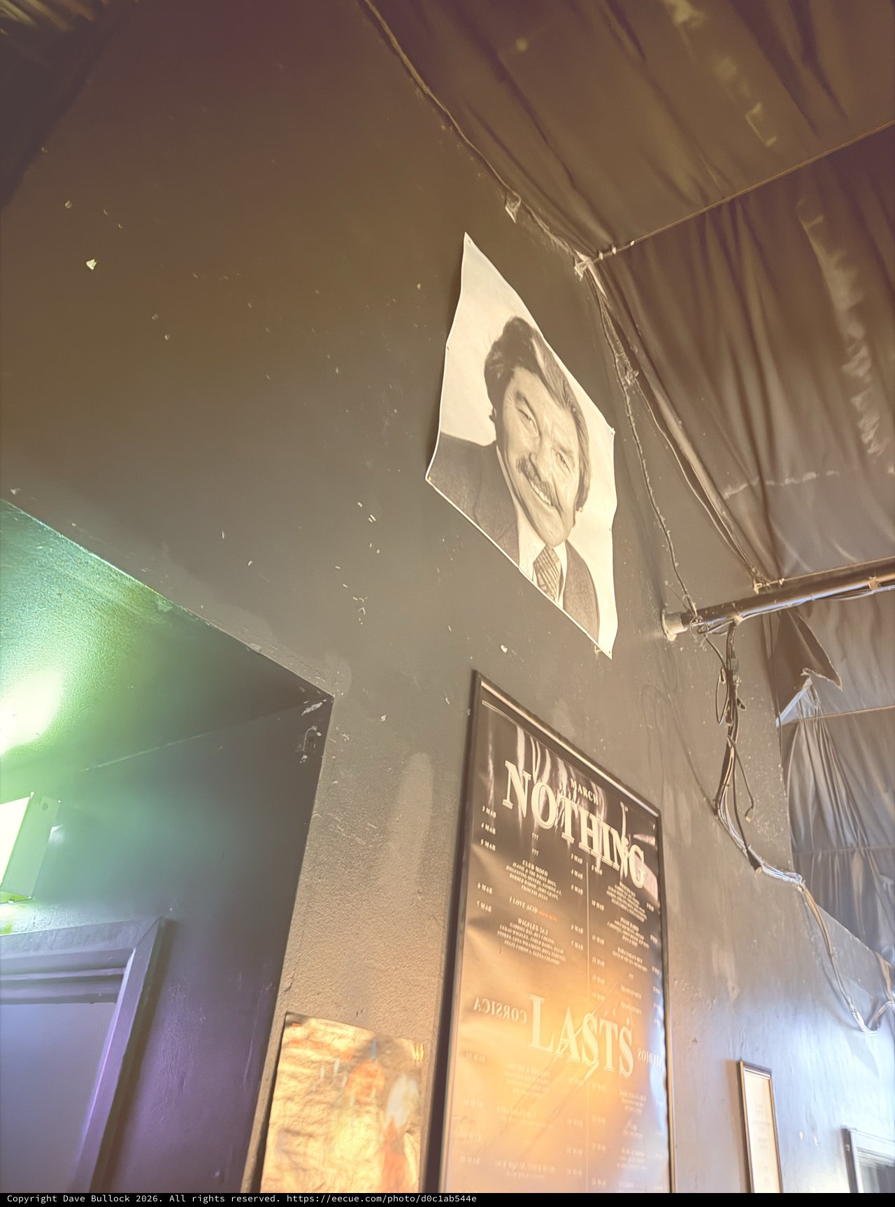 Industrial Nightclub Interior with Portrait and Poster