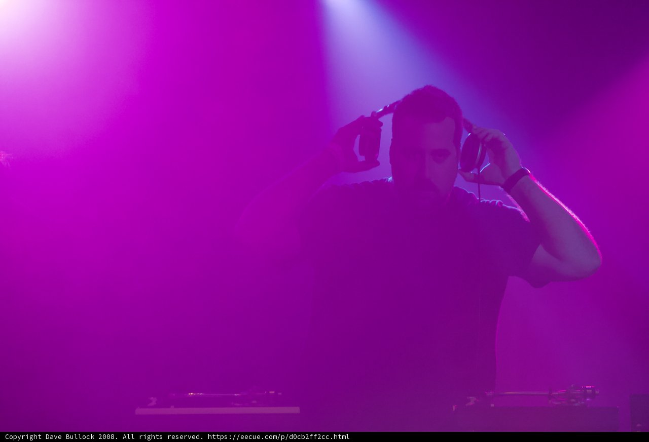 Solo Performance Under Purple Lights