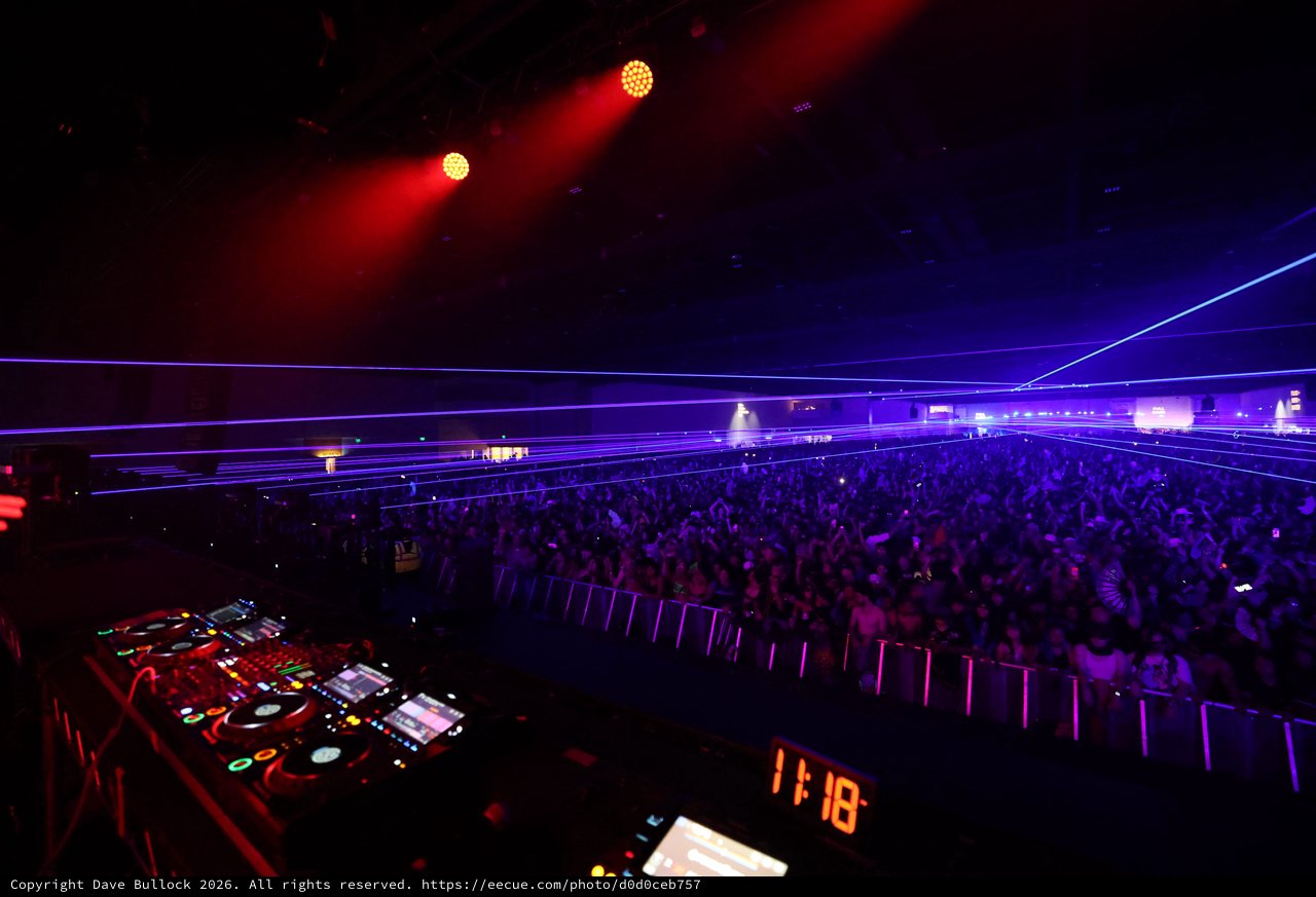 Laser Light Spectacle Over Pulsing Festival Crowd