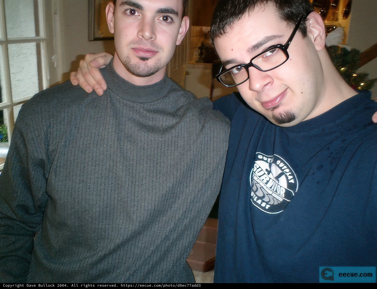 Two Men in Glasses Strike a Pose