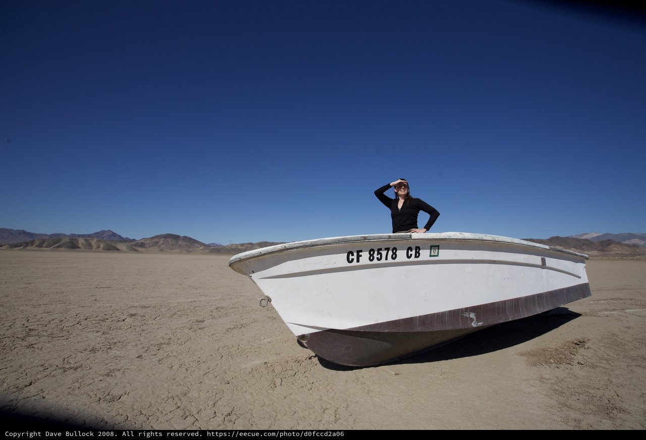 Lost at Sea: Woman Surveys a Dry Desert Lakebed