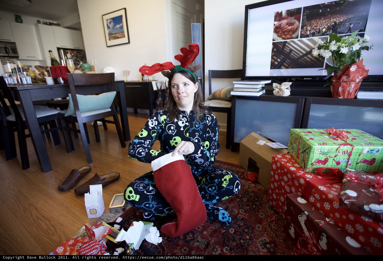 Penelope Opens Christmas Stocking in Festive Pajamas