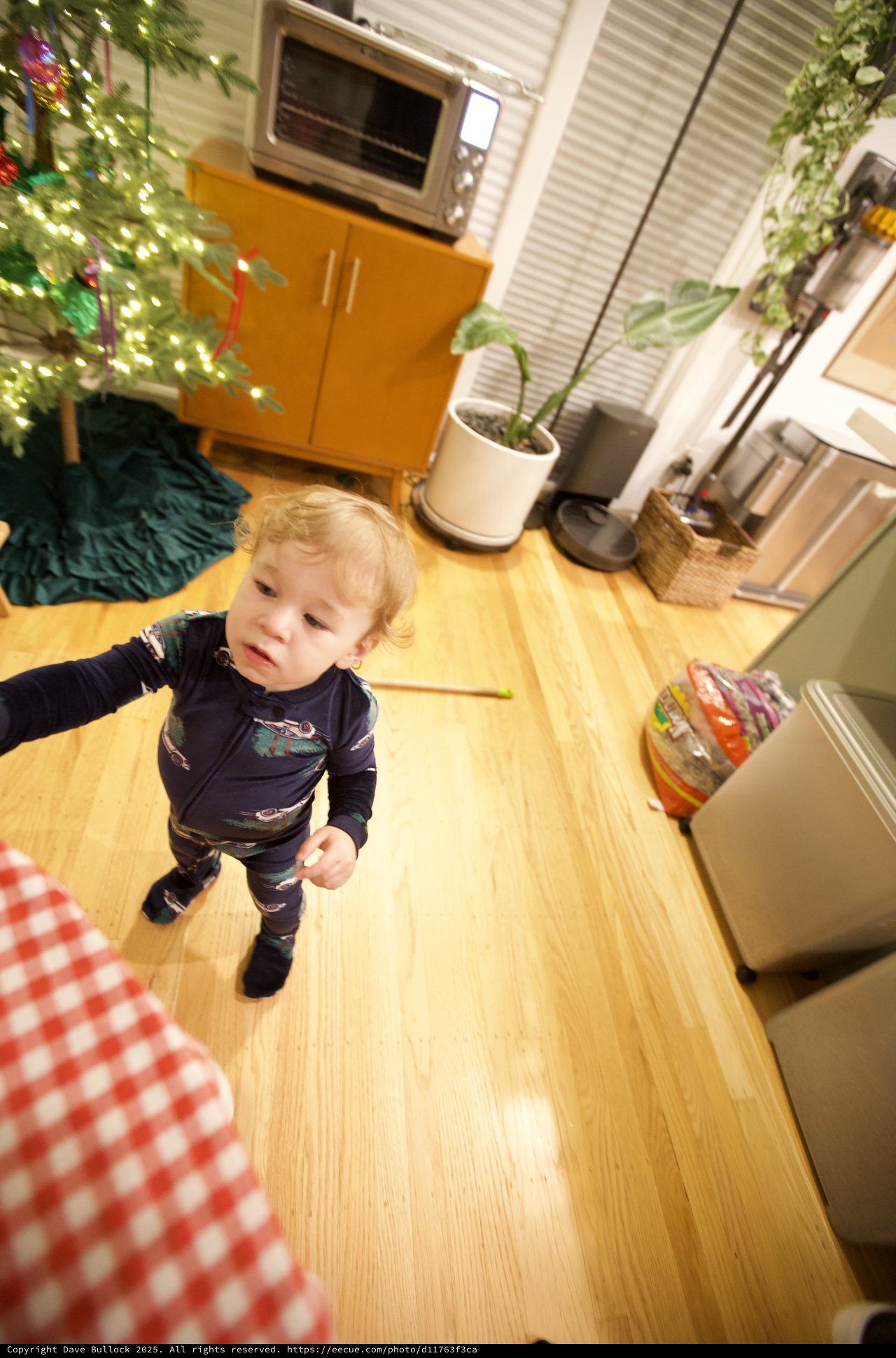 Toddler in Christmas Pajamas at Home