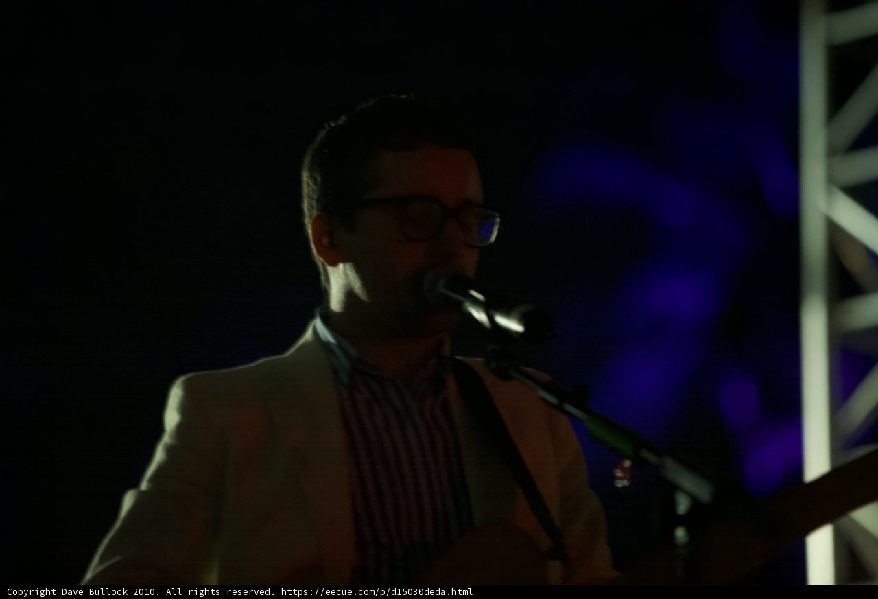 Man in Glasses Belts Out a Tune