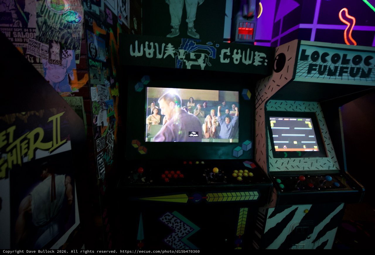Retro Arcade Bar with Vintage Games and Neon Lights