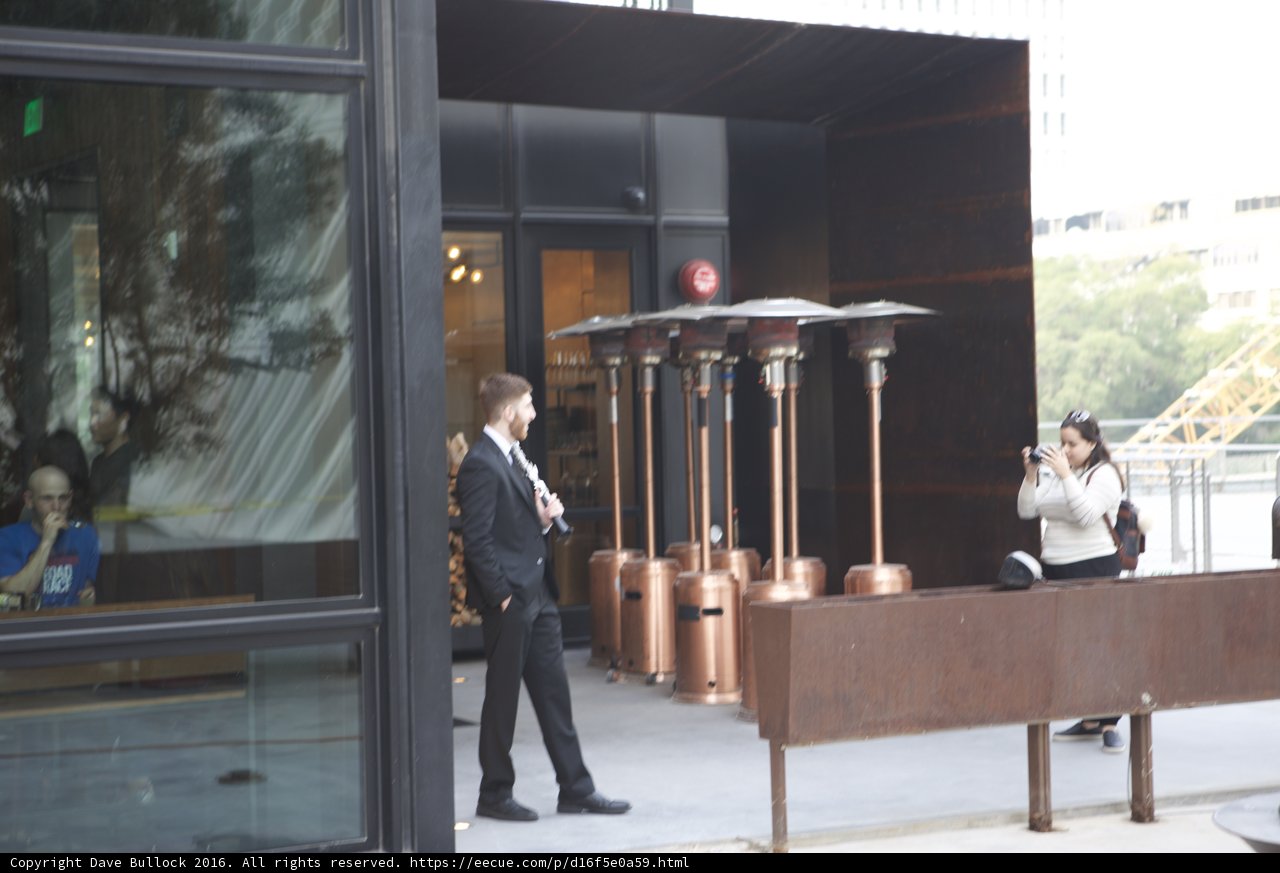 Formal Man Standing Outside Building