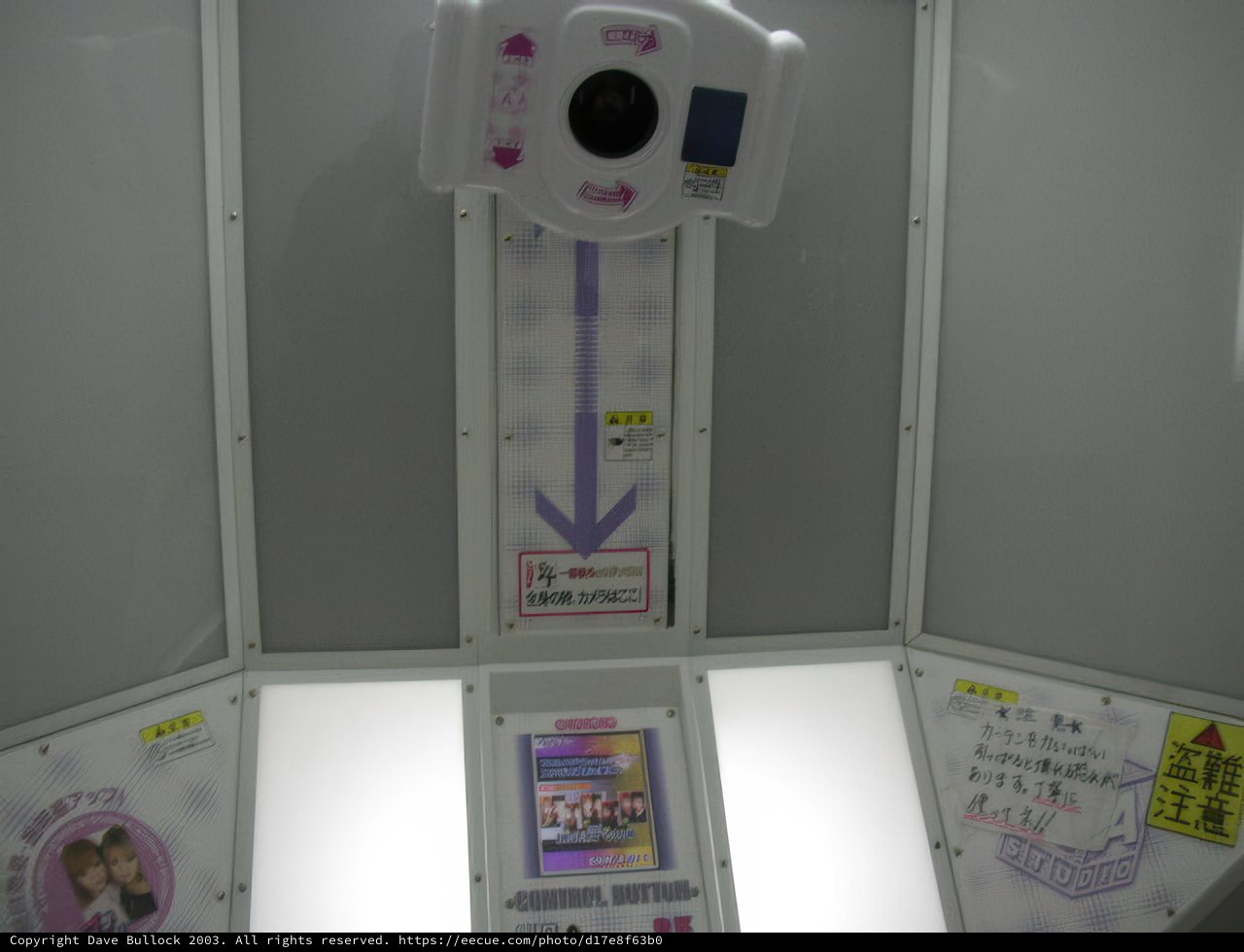 Pink and White Bathroom with Camera