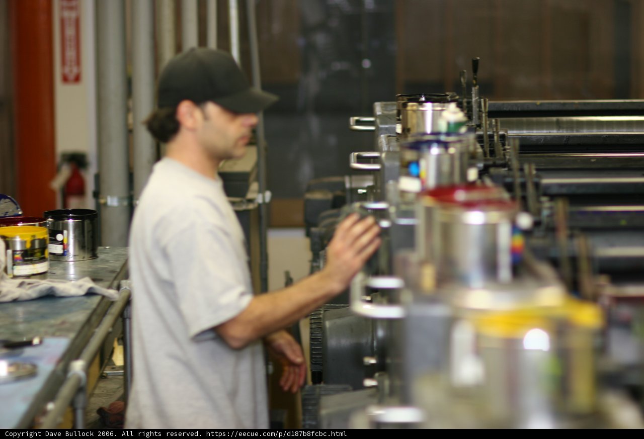 Gray Shirt and Baseball Cap in the Factory