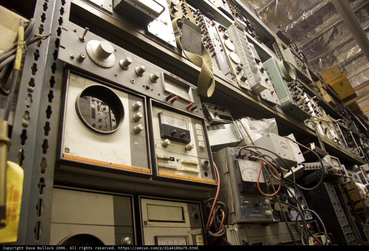 Organized Chaos: A Shelf Full of Electrical Equipment