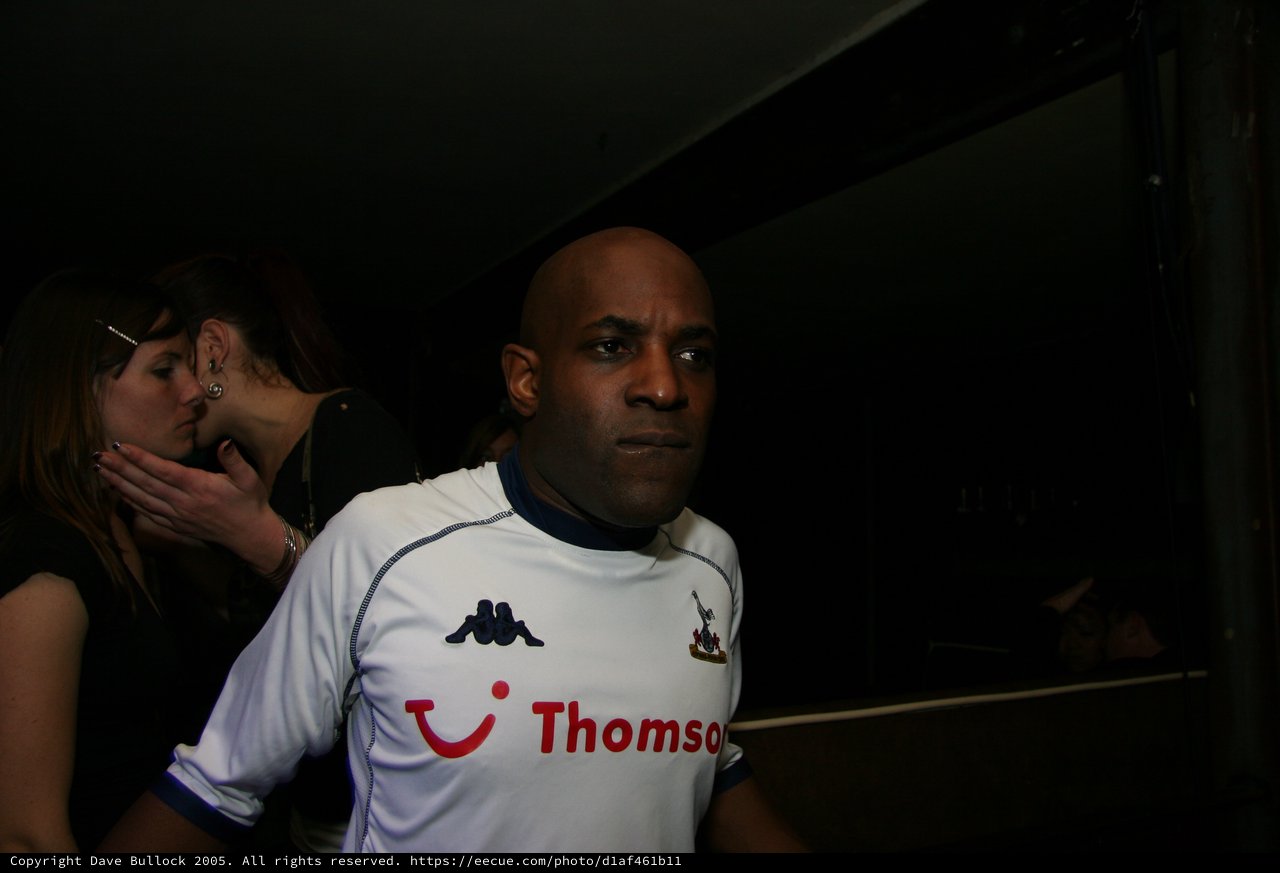 Man in Tottenham Hotspur Jersey at Nightclub Event