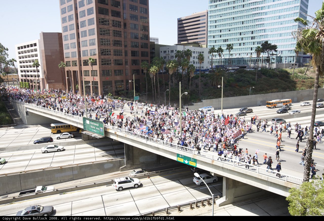A Sea of People Crossing the Overpass