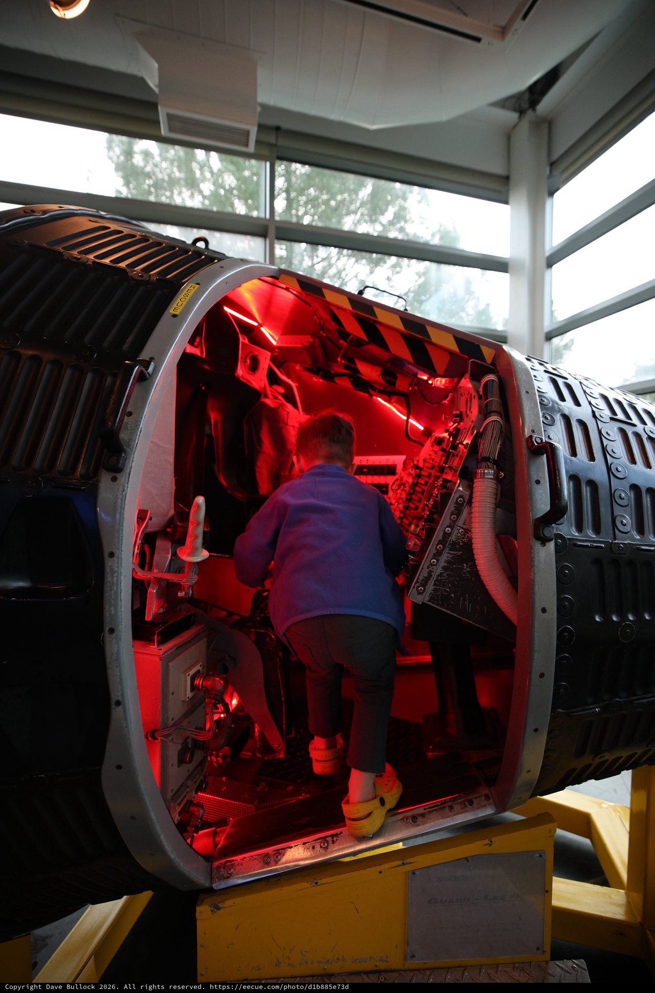 Inside the Red-Lit Interior of Historic Aircraft Fuselage