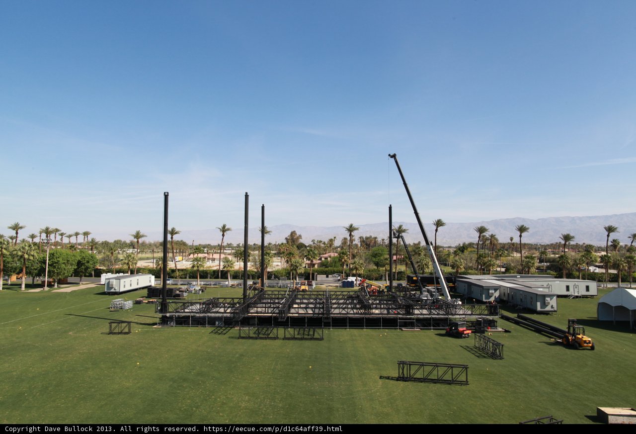 Stage set up in the middle of a grassy field