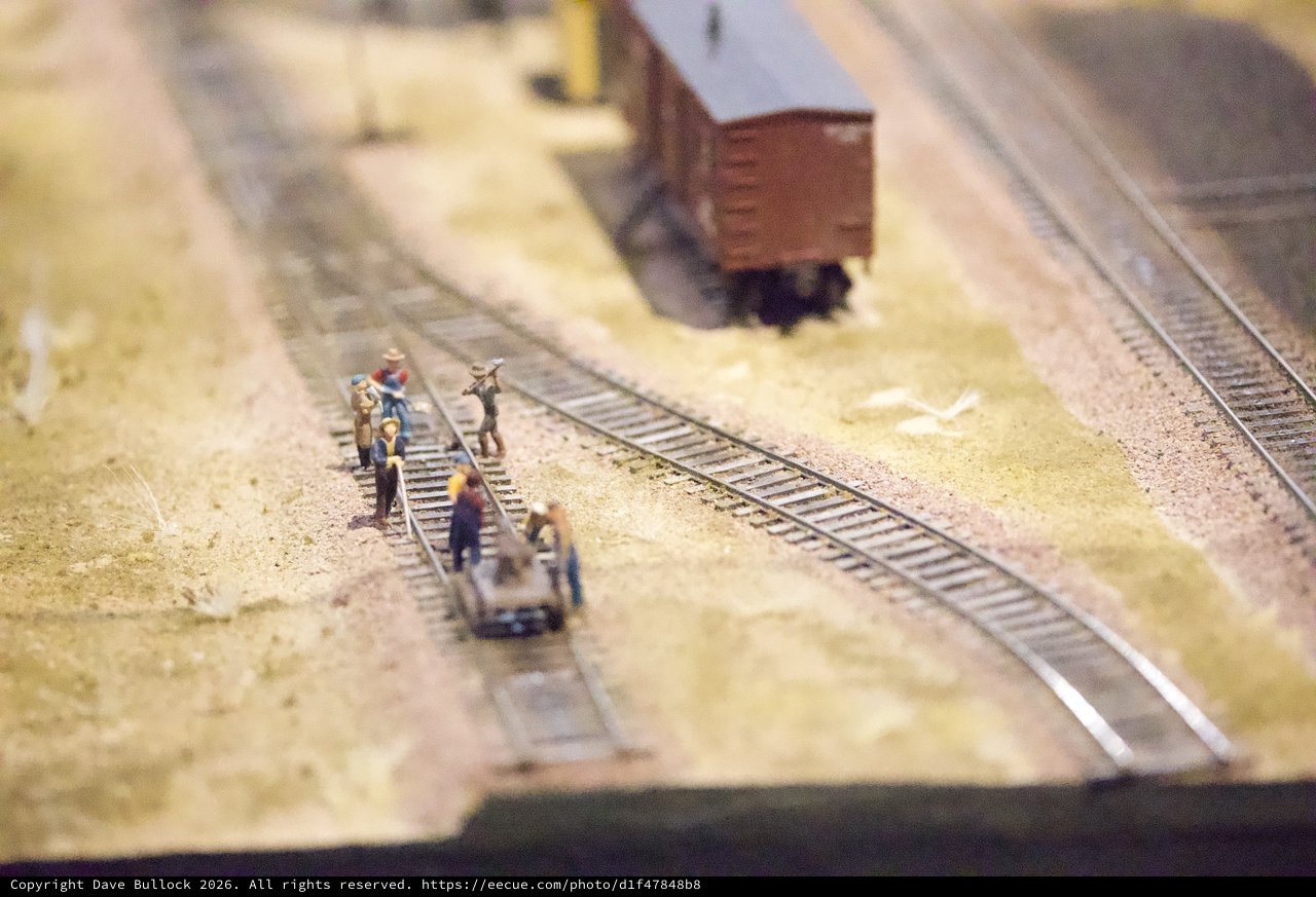 Miniature Railway Workers on Model Train Track Diorama