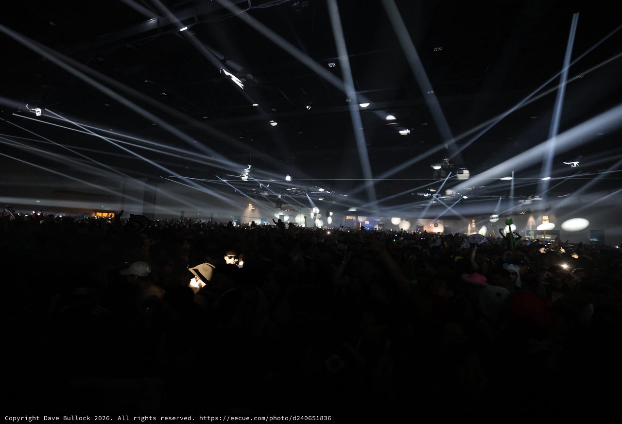 Laser Light Storm Over Massive Festival Crowd
