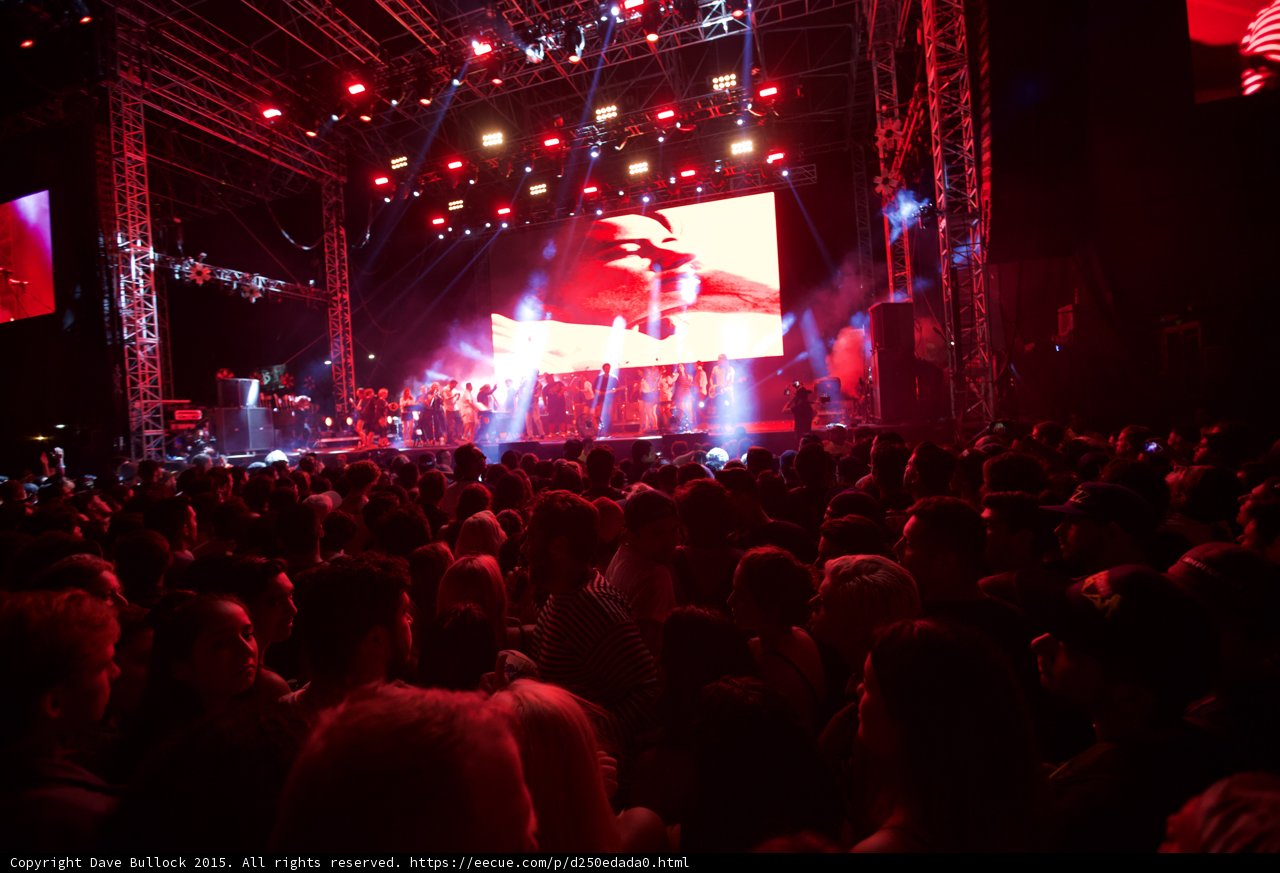 Belle and Sebastian Wide Stage Video Screen Romantic Red Lighting Ensemble Phone Recording Crowd