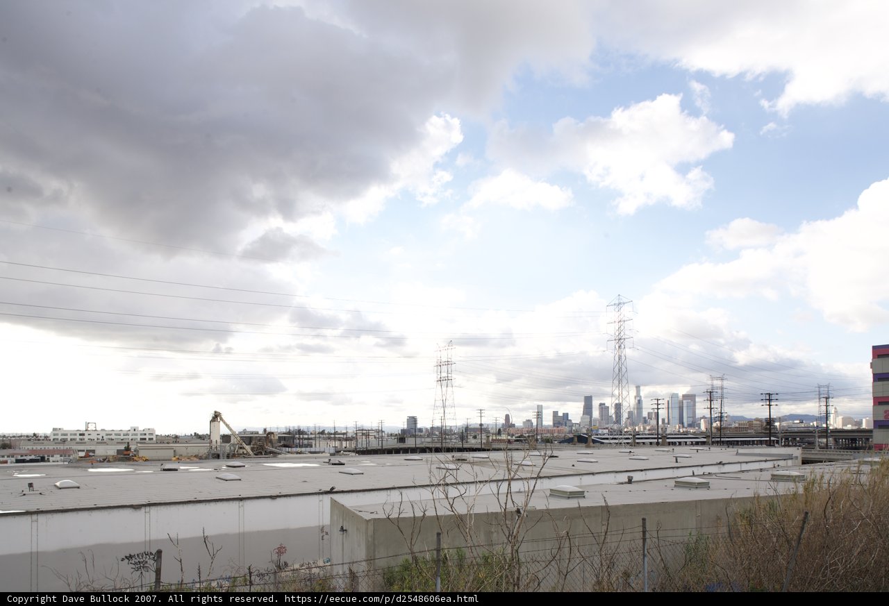 Cloudy Sky over Industrial Waterfront