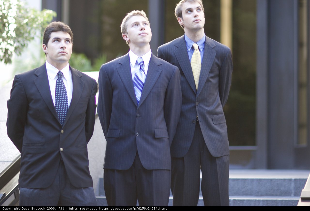 Three Dapper Men in Formal Wear