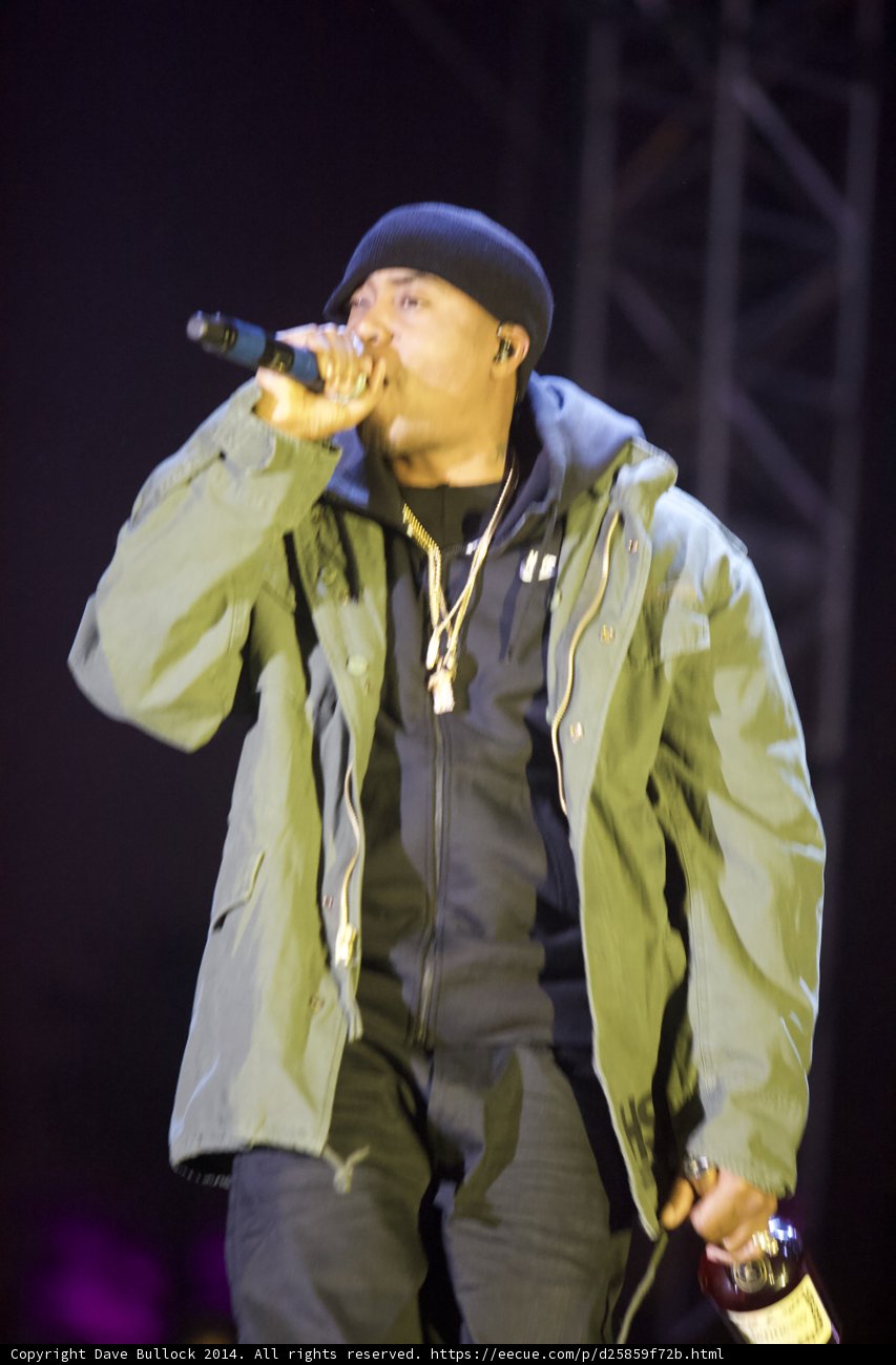 Solo Performance in Green Jacket and Black Hat