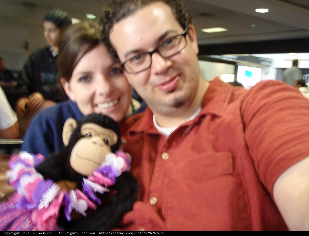 Couple and Monkey Plush at Hawaii Airport Departure