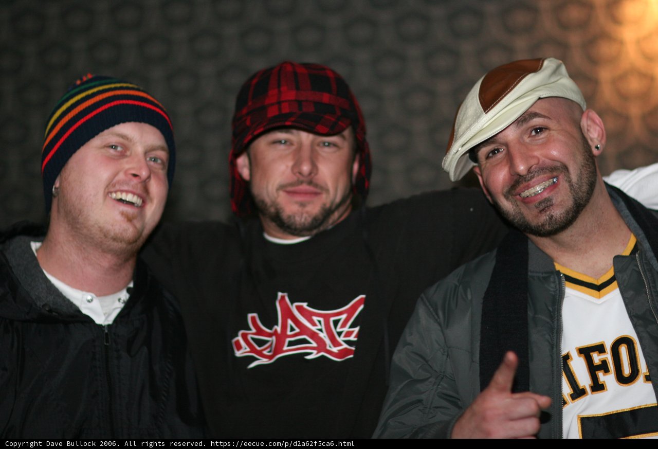 Three Men Strike a Cool Pose for the Camera