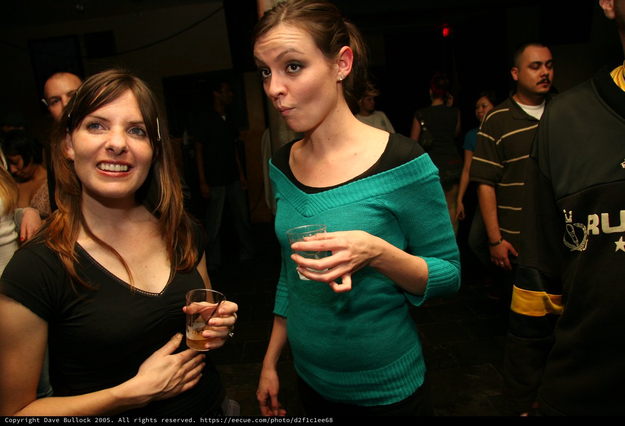 Friends Raising Glasses at a Nightclub Party